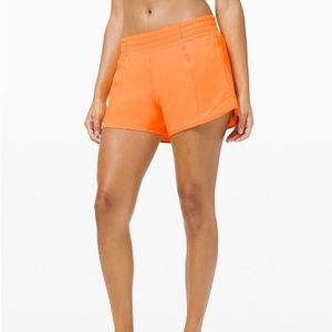 Lululemon Hotty Hot High Rise 4” in hard to find orange